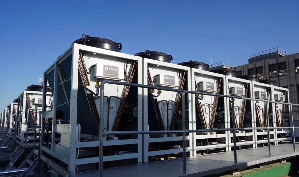 Outdoor condenser bank serving Vertiv precision-cooling units